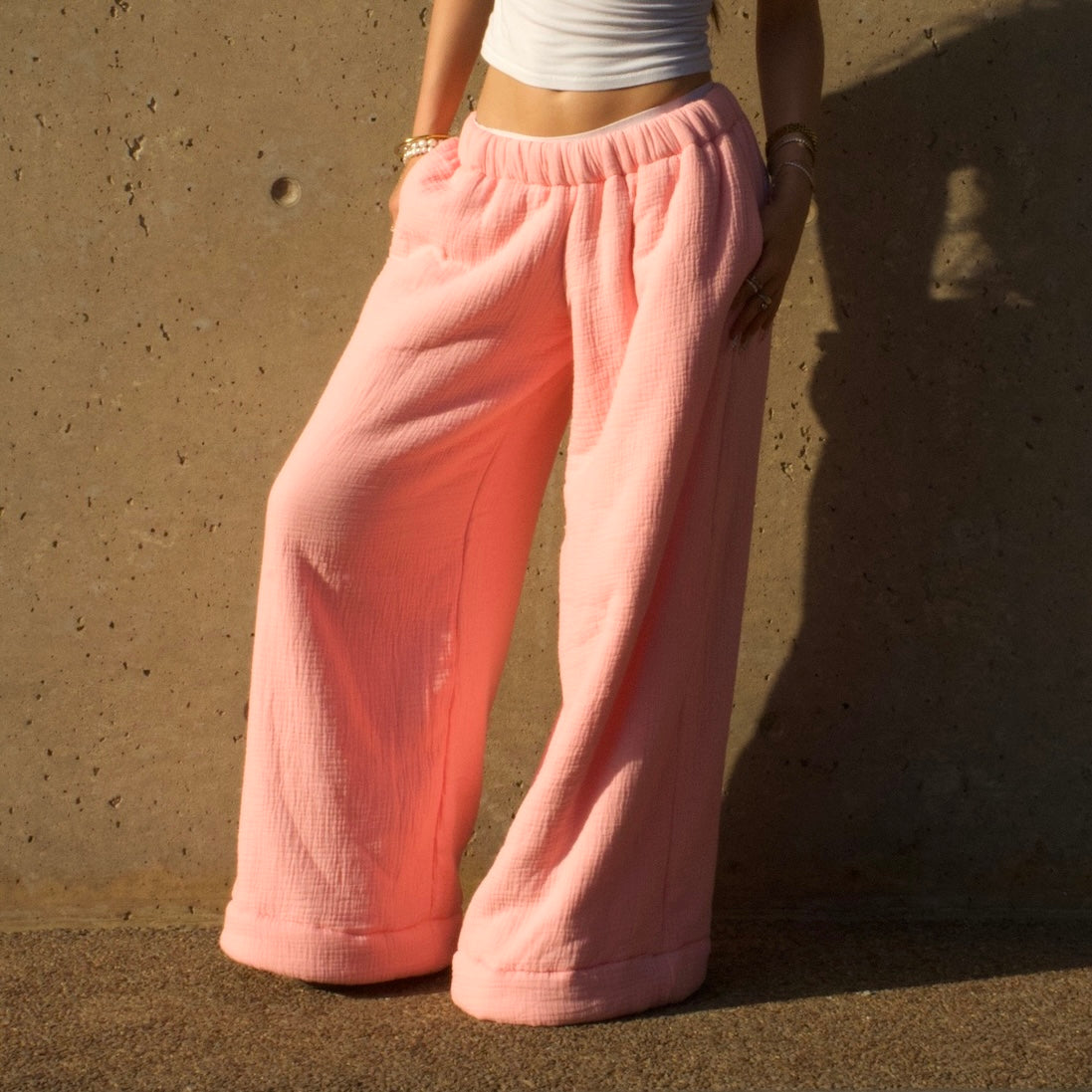 Model wearing Marieloulou Homebody Low Rise Sweatpants in Pink